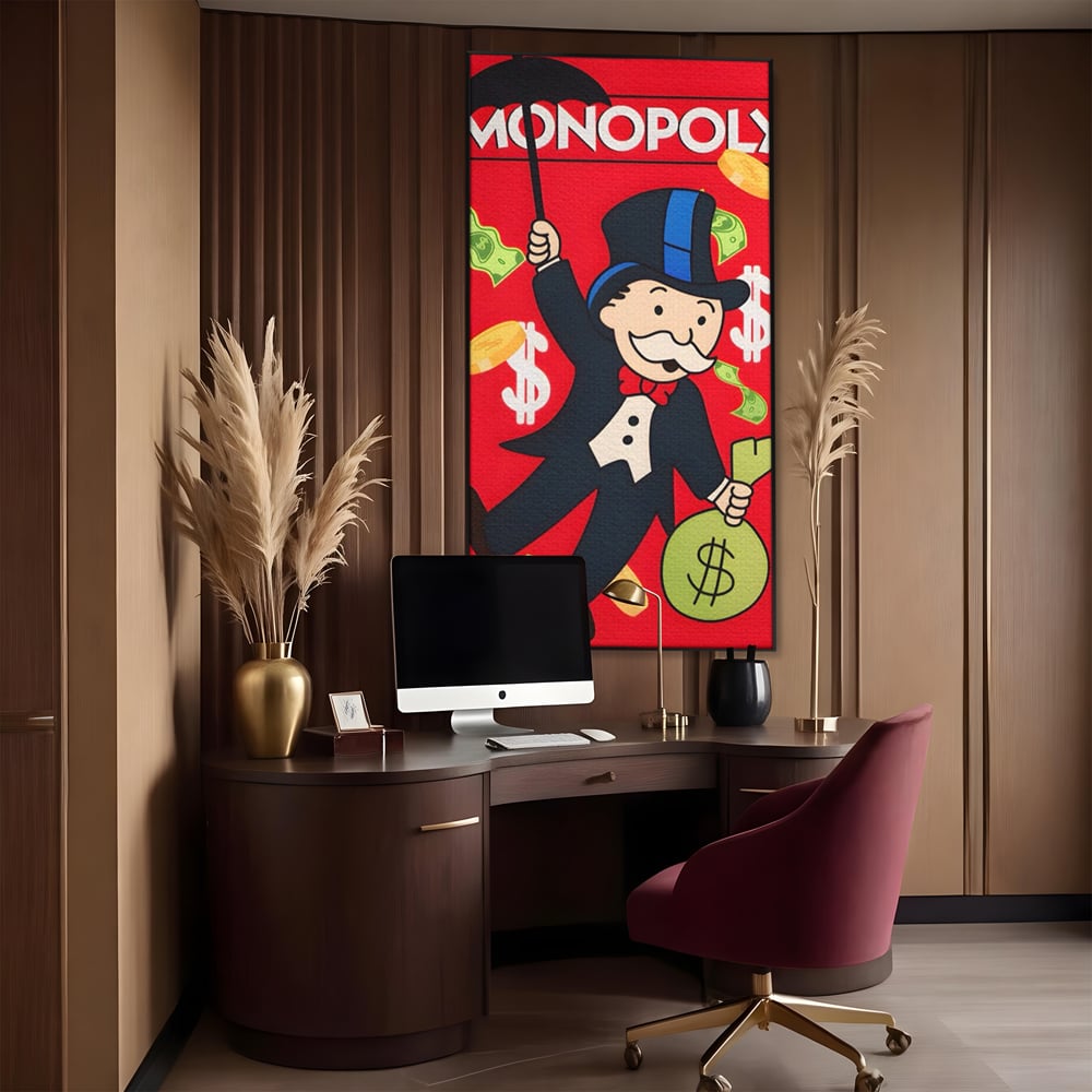 Tablou canvas cu tablou canvas cu domnul monopoly pe fond rosu, in rama de aluminiu negru, pe perete intr-un birou